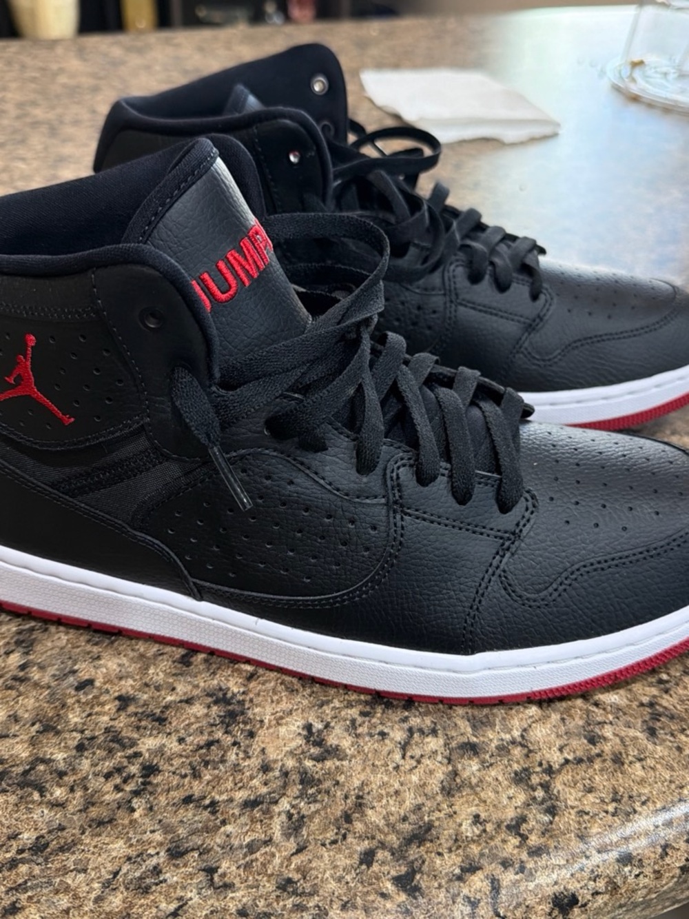 Jordan Men’s Black and Red Mid-Top Sneakers